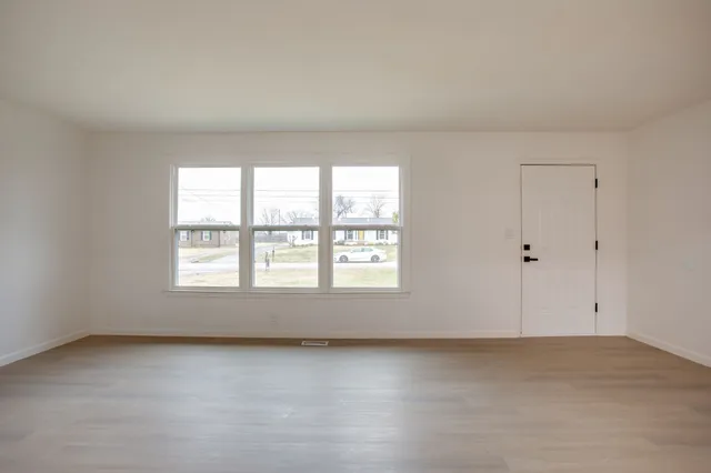 an empty room with a window