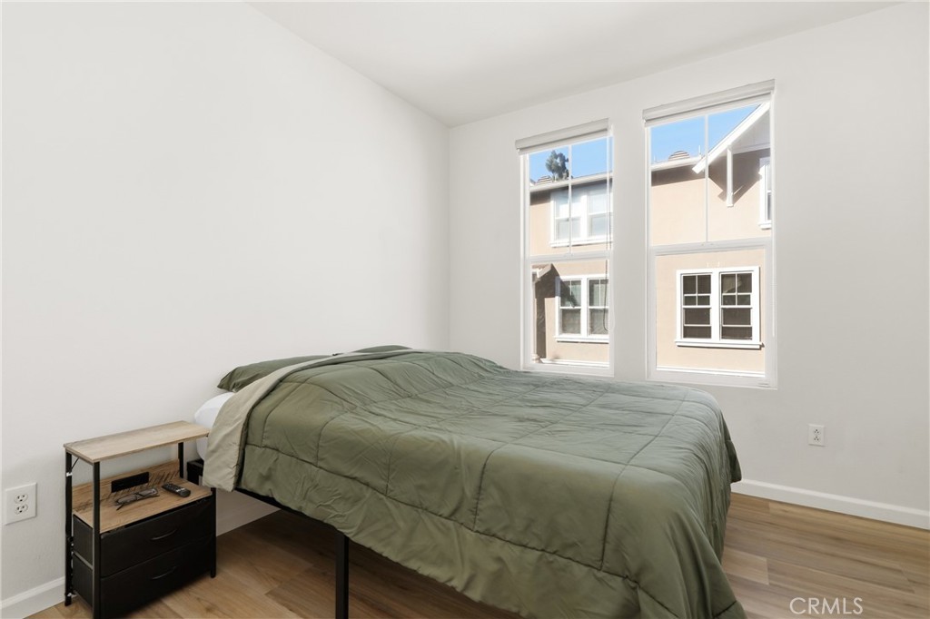 52 Valmont Way Ladera Ranch, CA 92694 - Photo 15 of 29 a bedroom with a bed and a window