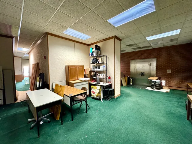a room with furniture and a wooden floor