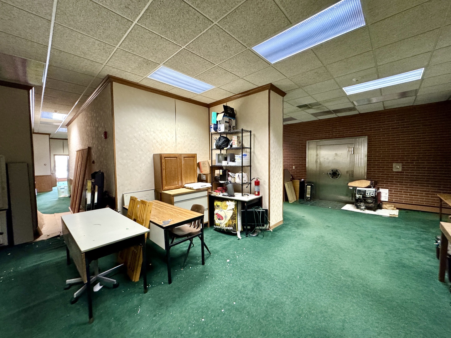 100 West Main Street Tiskilwa, IL 61368 - Photo 11 of 27 a room with furniture and a wooden floor