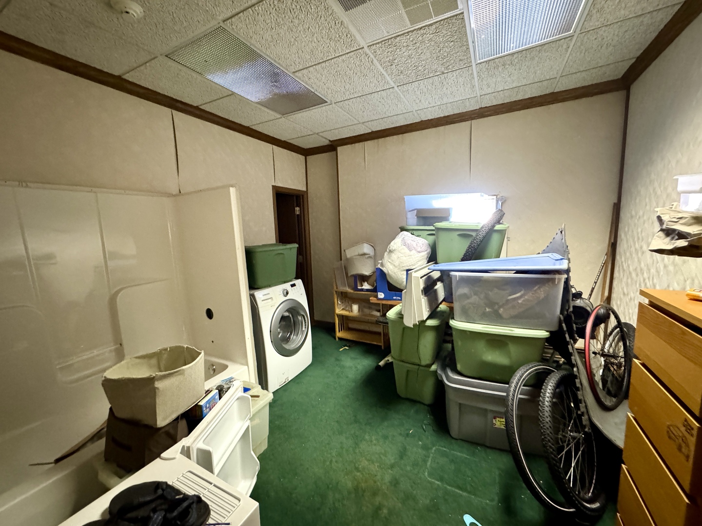 100 West Main Street Tiskilwa, IL 61368 - Photo 16 of 27 a bedroom with furniture and a chair