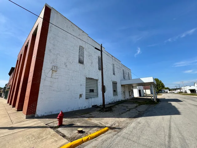 a view of pool with yard