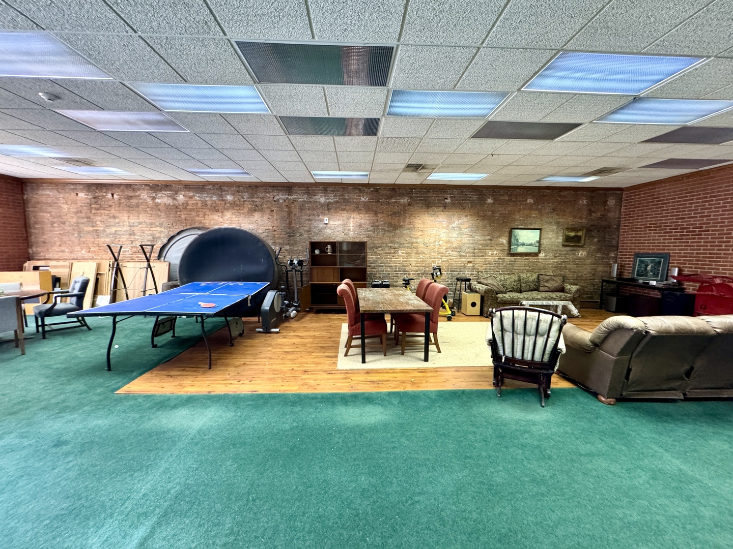 100 West Main Street Tiskilwa, IL 61368 - Photo 4 of 27 a living room with furniture and a pool