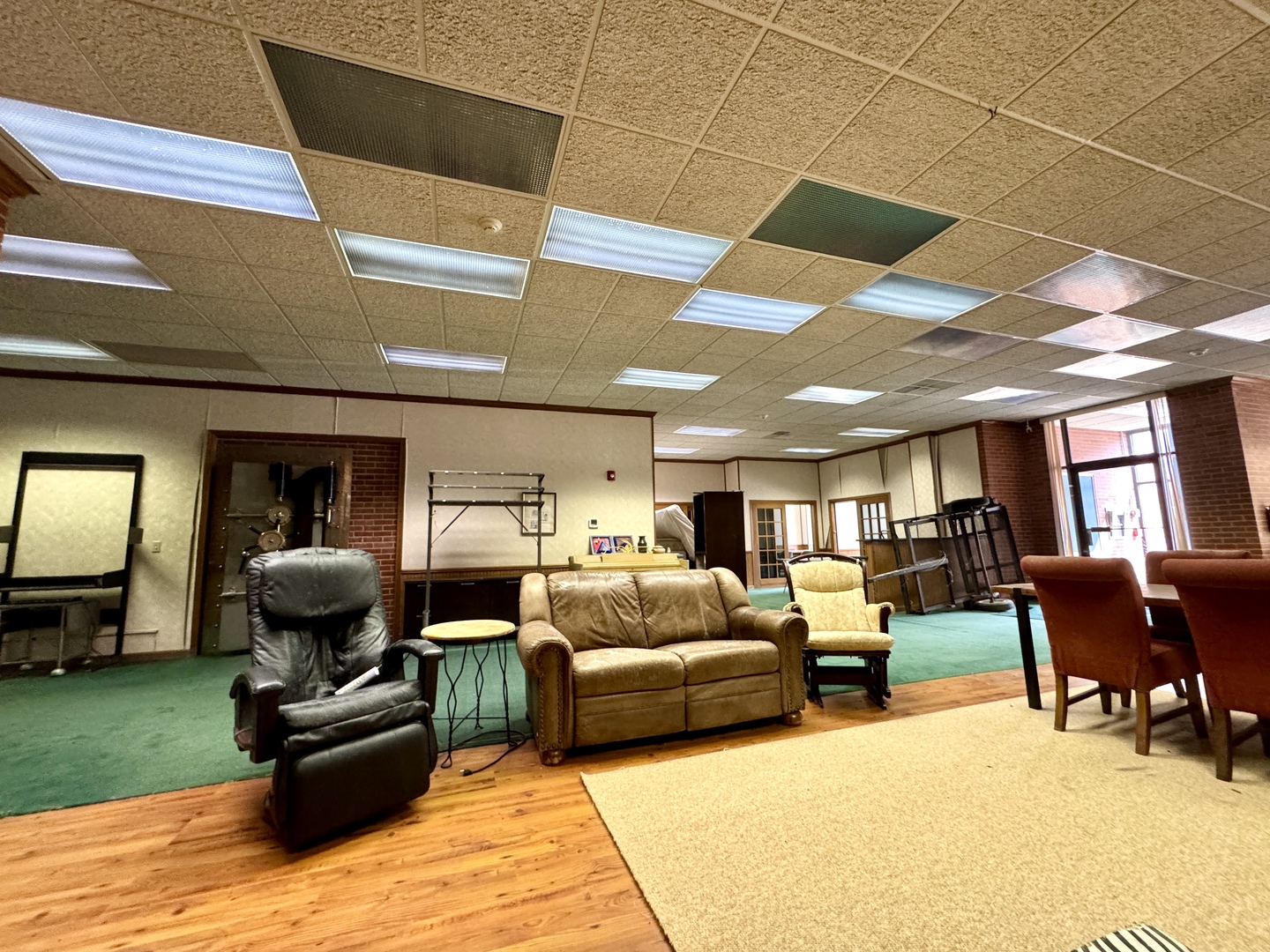 100 West Main Street Tiskilwa, IL 61368 - Photo 5 of 27 a living room with furniture and a fireplace
