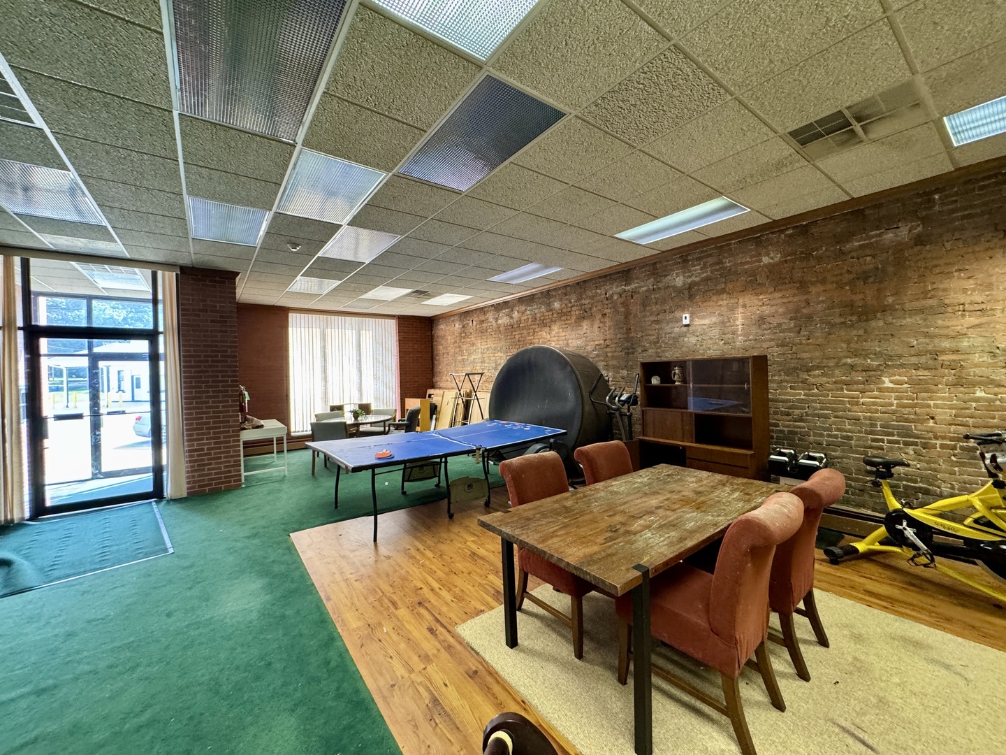 100 West Main Street Tiskilwa, IL 61368 - Photo 7 of 27 a backyard of a house with table and chairs