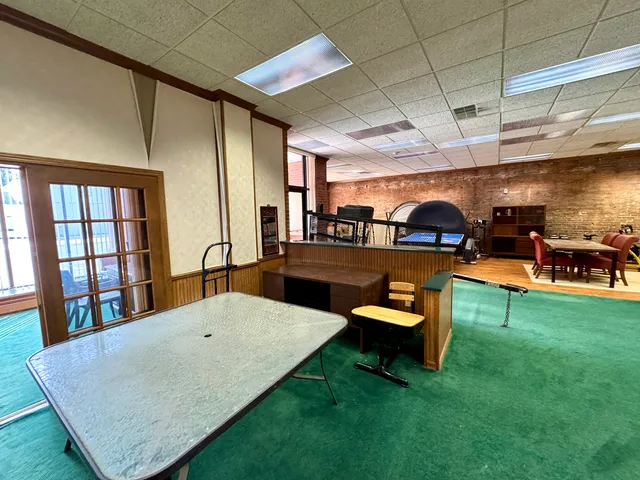 a living room with furniture and a table