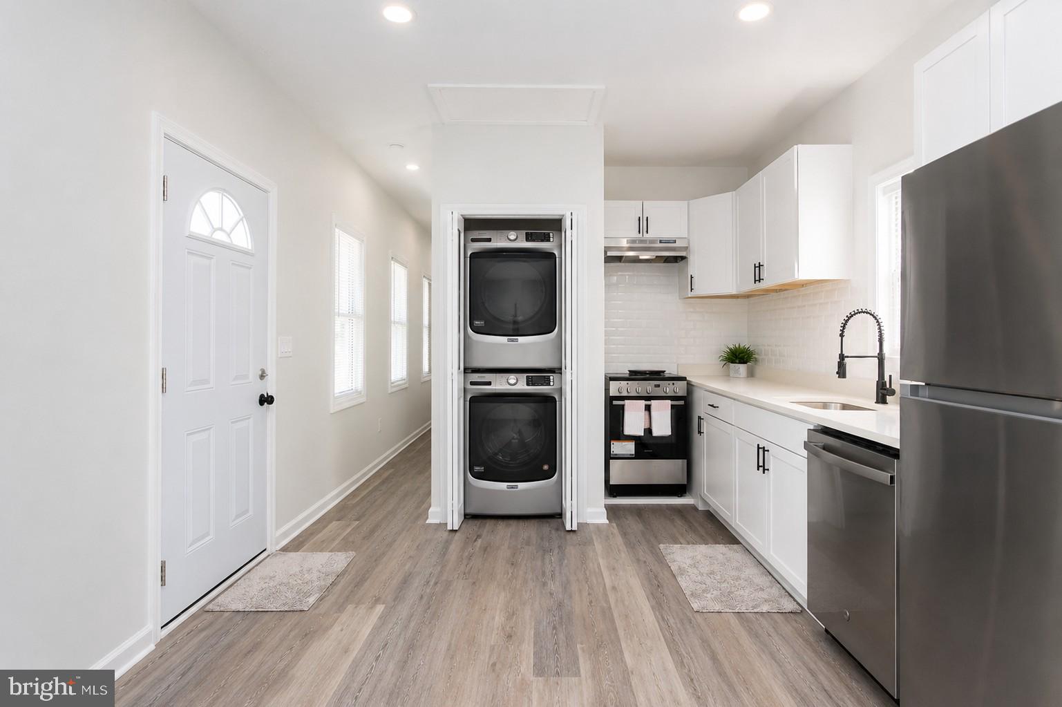 4319 Hadamar Road Spotsylvania, VA 22551 - Photo 15 of 24 a kitchen with stainless steel appliances a refrigerator sink and cabinets