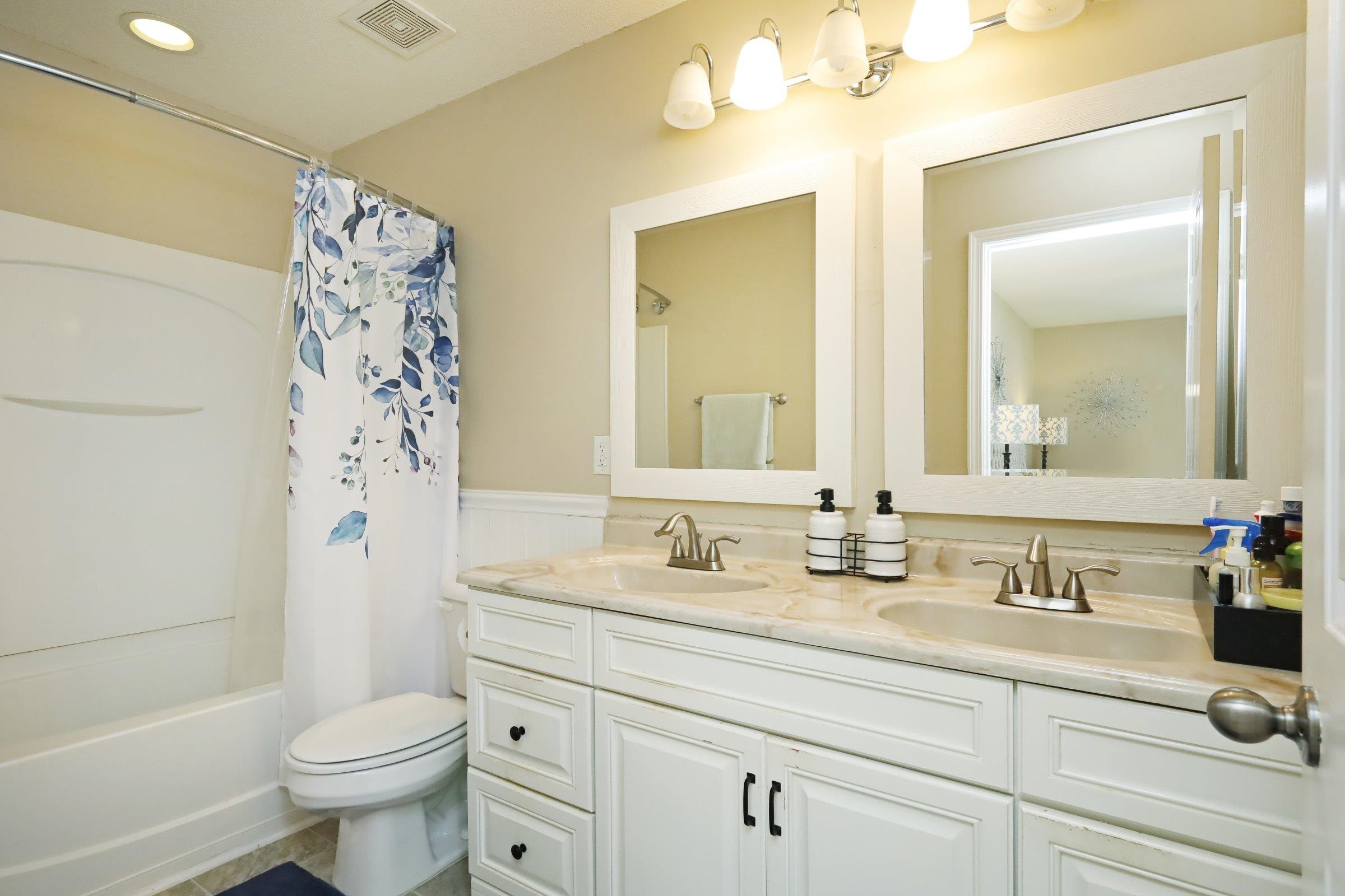 2439 Quarry Ridge Lane Raleigh, NC 27610 - Photo 26 of 41 a bathroom with a sink a toilet and shower