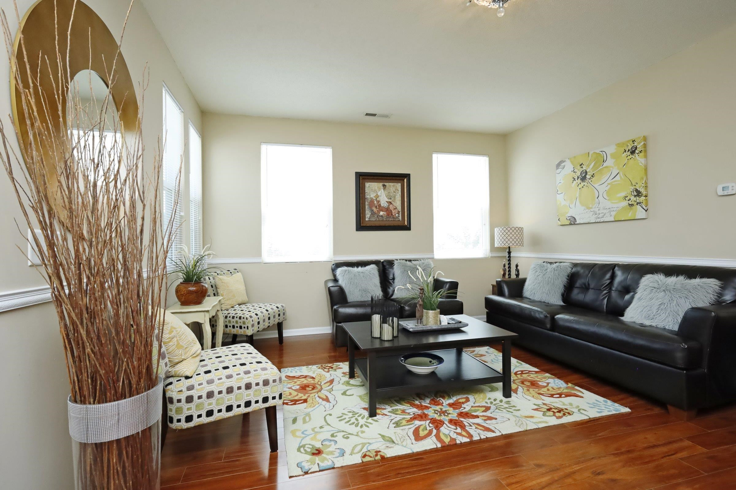 2439 Quarry Ridge Lane Raleigh, NC 27610 - Photo 5 of 41 a living room with furniture and wooden floor