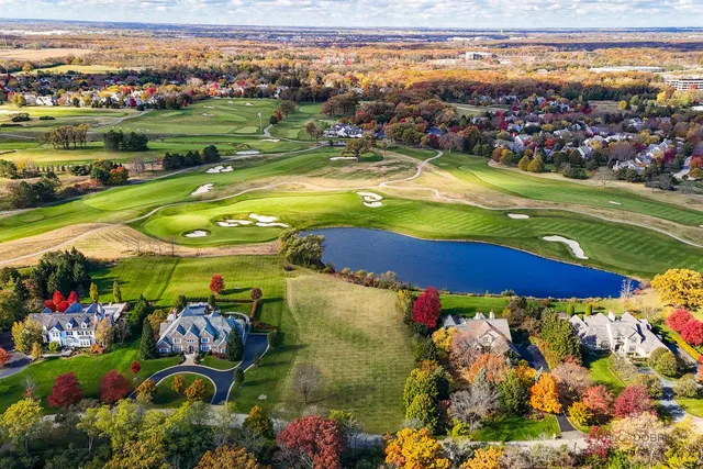 a view of a swimming pool with an outdoor space and seating area