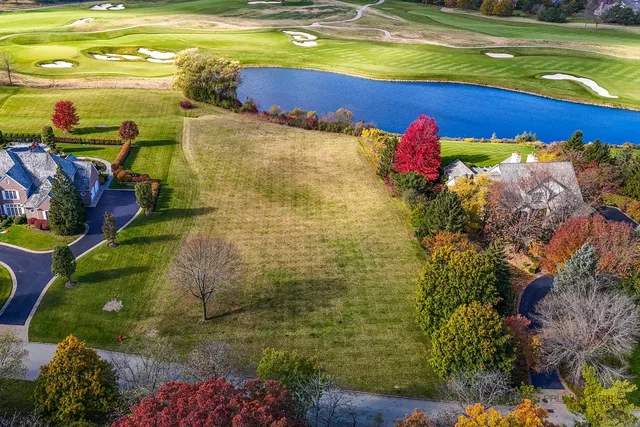 a view of a lake with a big yard