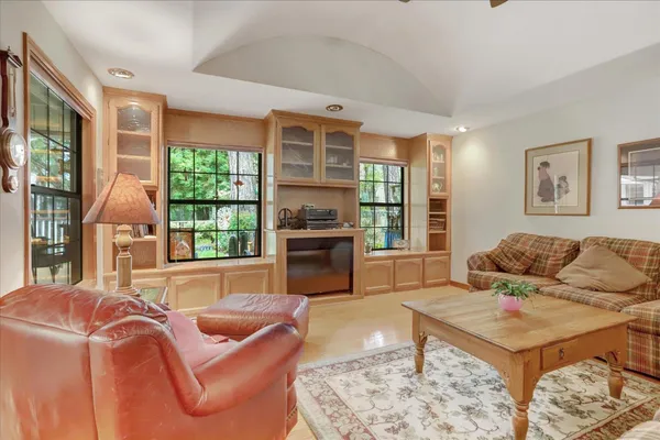 a spacious bathroom with a double vanity sink and a mirror