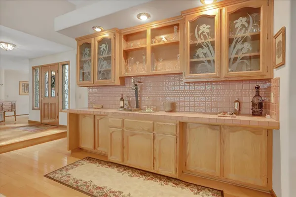 a bathroom with a sink double vanity and a mirror