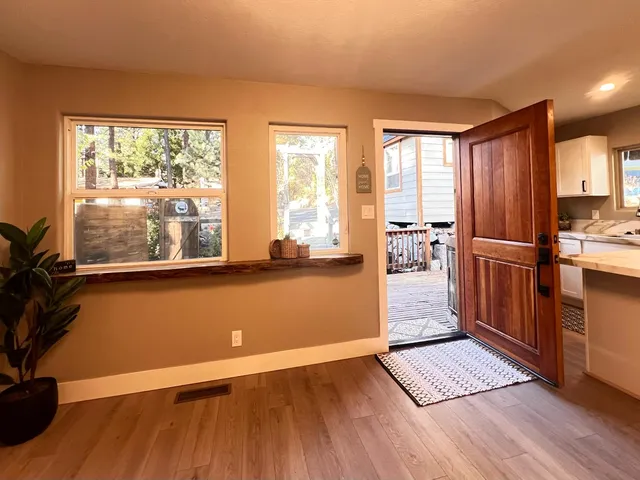 a kitchen with a sink stove and refrigerator