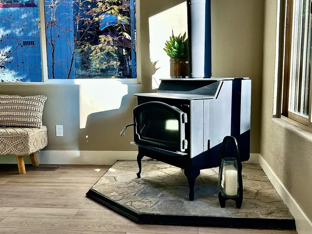 a view of a livingroom with a furniture wooden floor and window