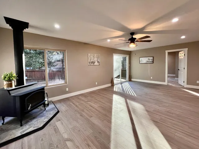a view of a living room and hardwood floor