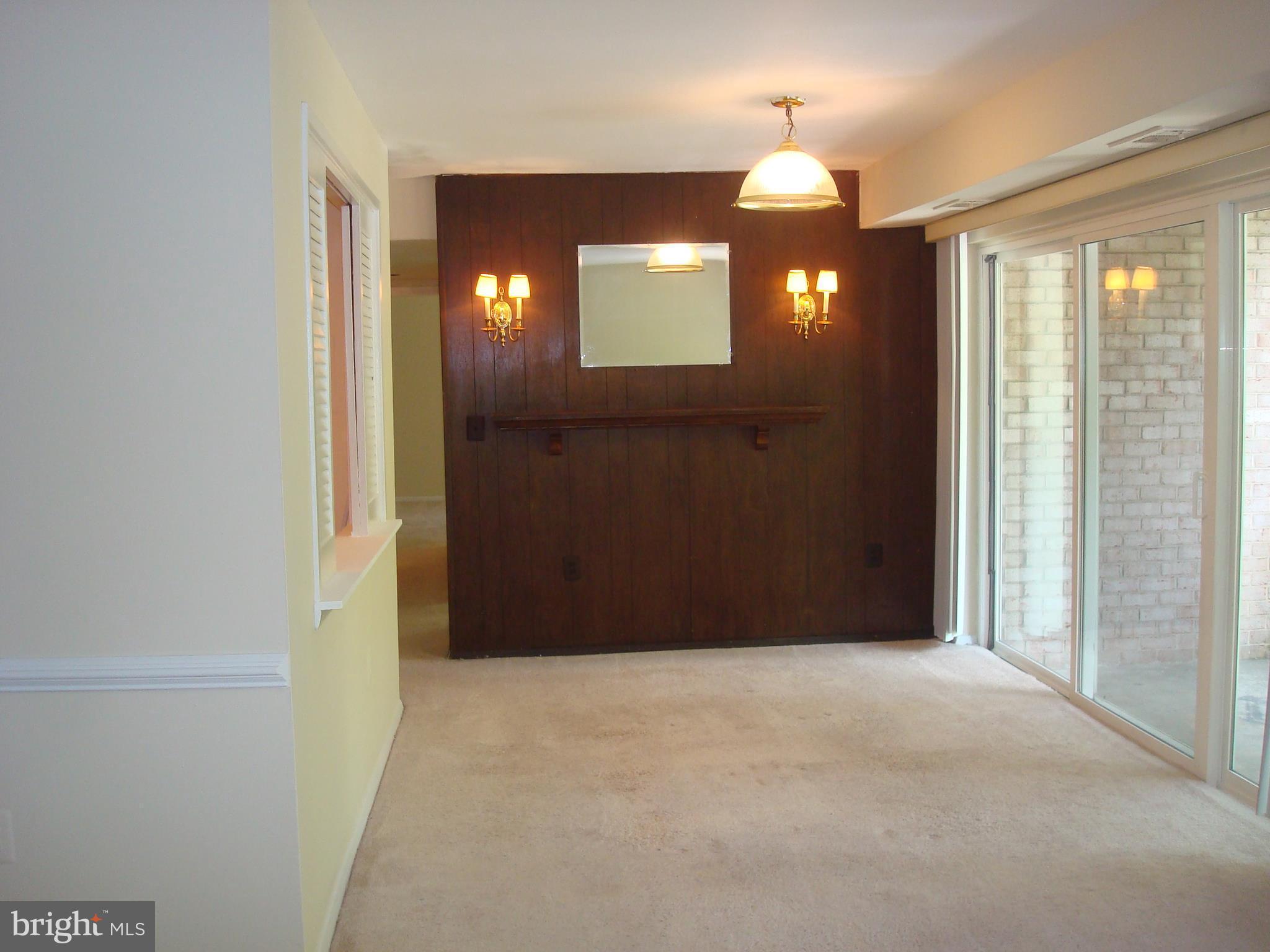 3742 Bel Pre Road, Unit 12 Silver Spring, MD 20906 - Photo 6 of 21 Dining room opens to the kitchen and the balcony.