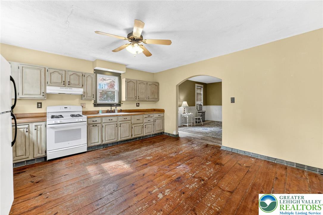 202 Main Street Portland, PA 18343 - Photo 13 of 40 a view of a kitchen with a sink cabinets and wooden floor