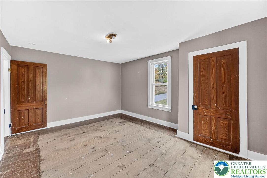 202 Main Street Portland, PA 18343 - Photo 14 of 40 an empty room with windows