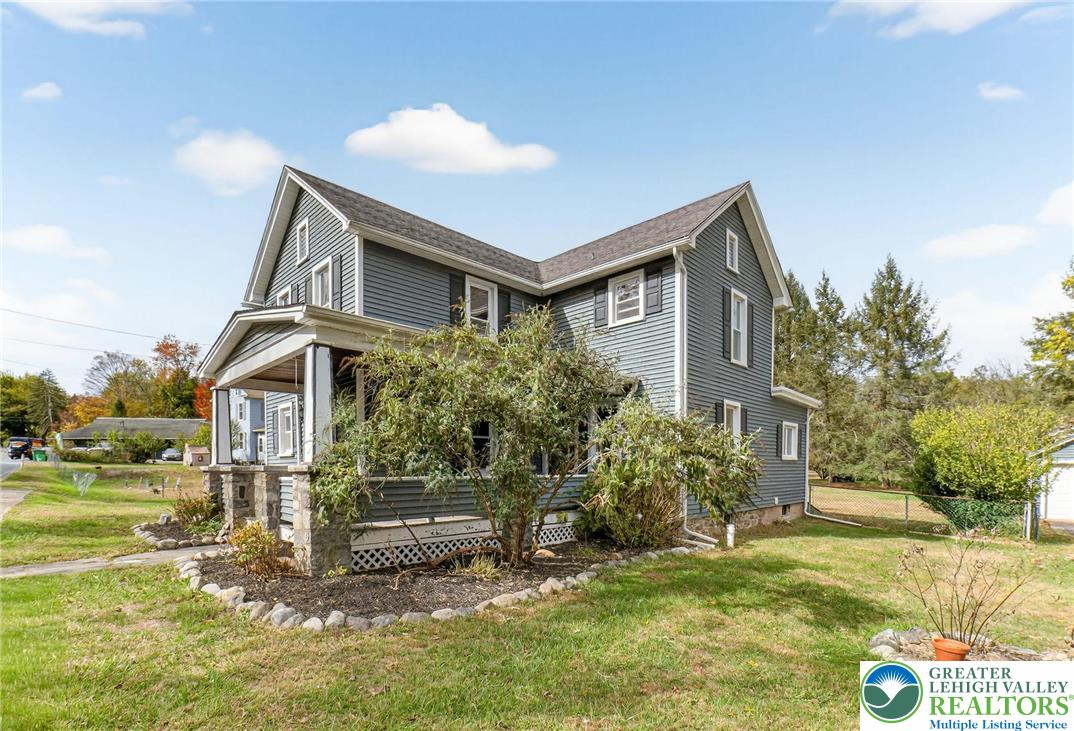 202 Main Street Portland, PA 18343 - Photo 2 of 40 a front view of a house with a yard