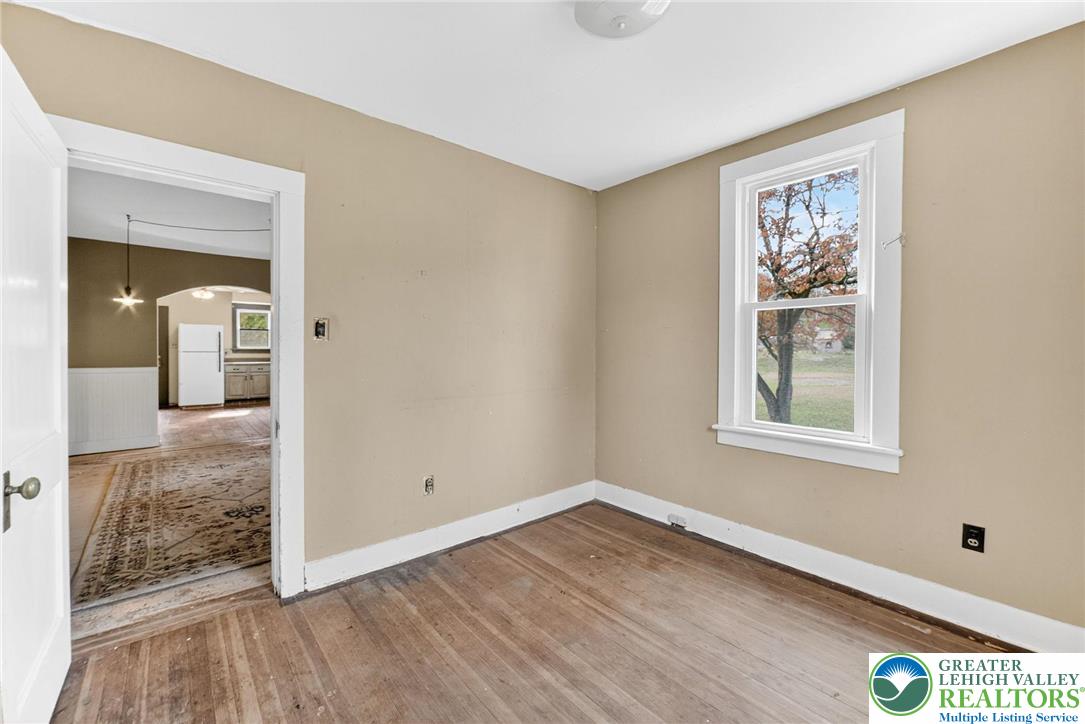 202 Main Street Portland, PA 18343 - Photo 22 of 40 a view of hallway with window and wooden floor