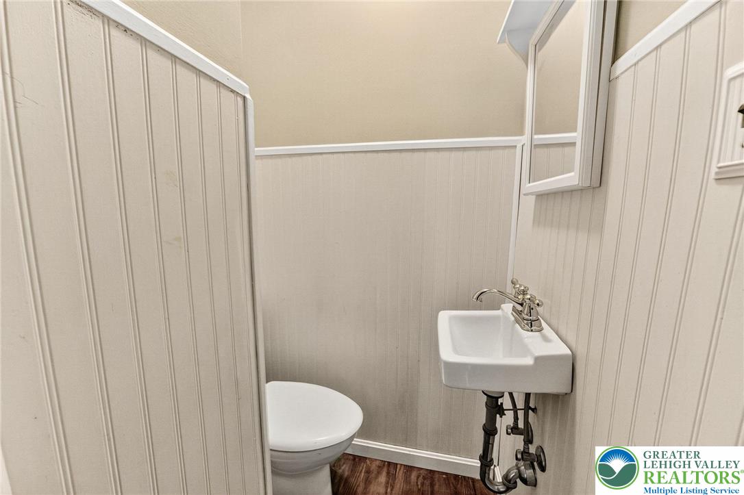 202 Main Street Portland, PA 18343 - Photo 24 of 40 a bathroom with a sink toilet and a mirror