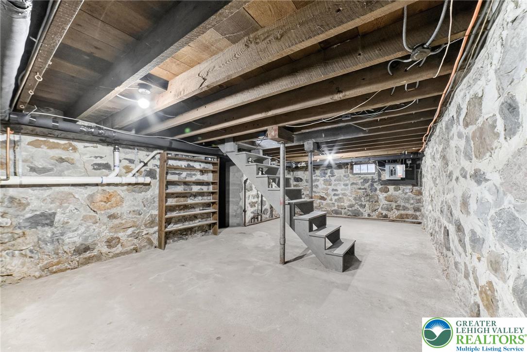 202 Main Street Portland, PA 18343 - Photo 33 of 40 a view of a storage room with racks on the wall