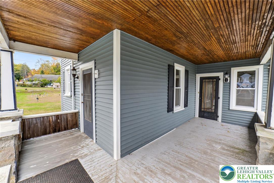 202 Main Street Portland, PA 18343 - Photo 5 of 40 a view of a porch with wooden floor