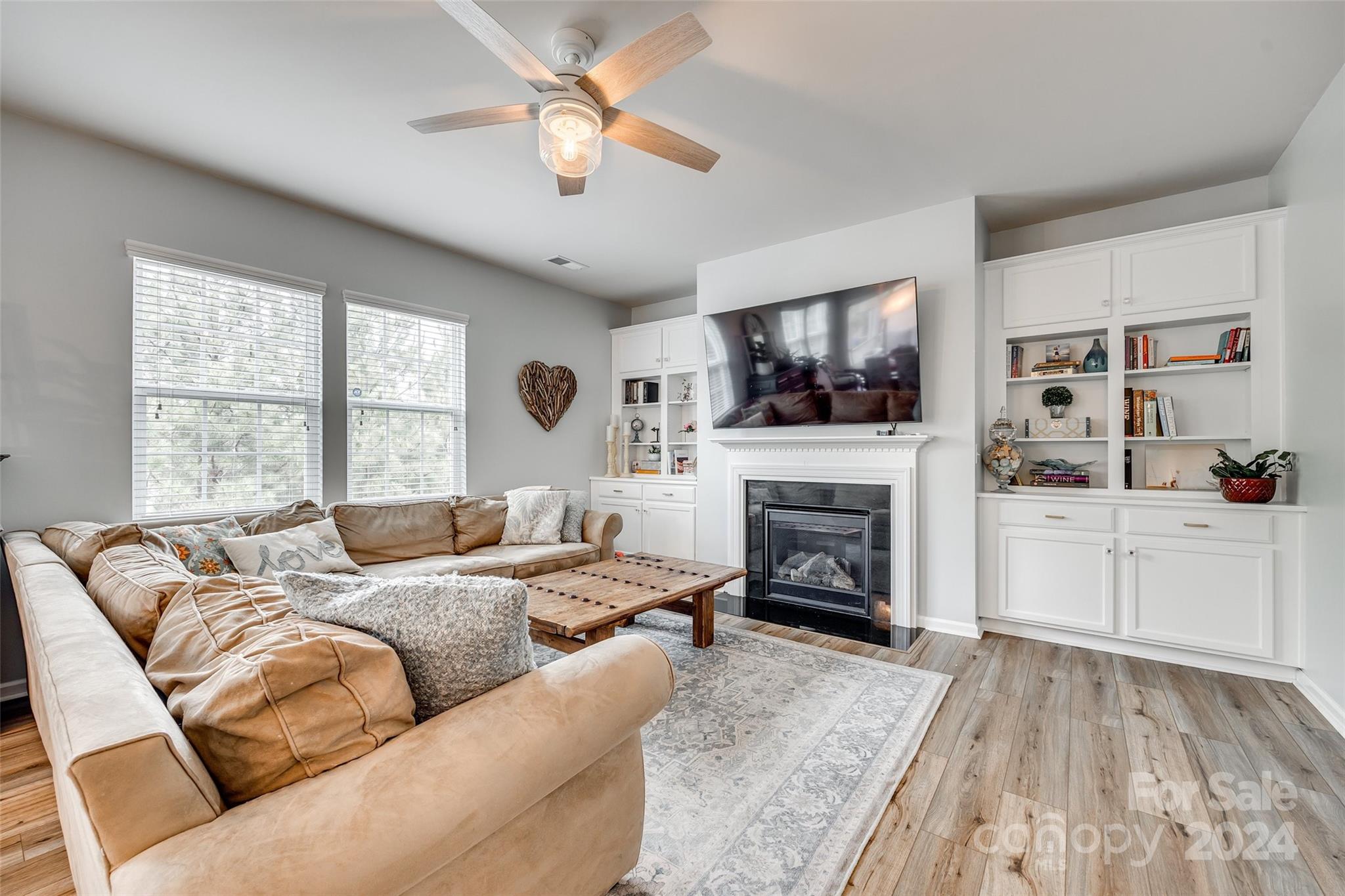 2251 Elmview Lane Fort Mill, SC 29715 - Photo 13 of 46 a living room with furniture fireplace and window