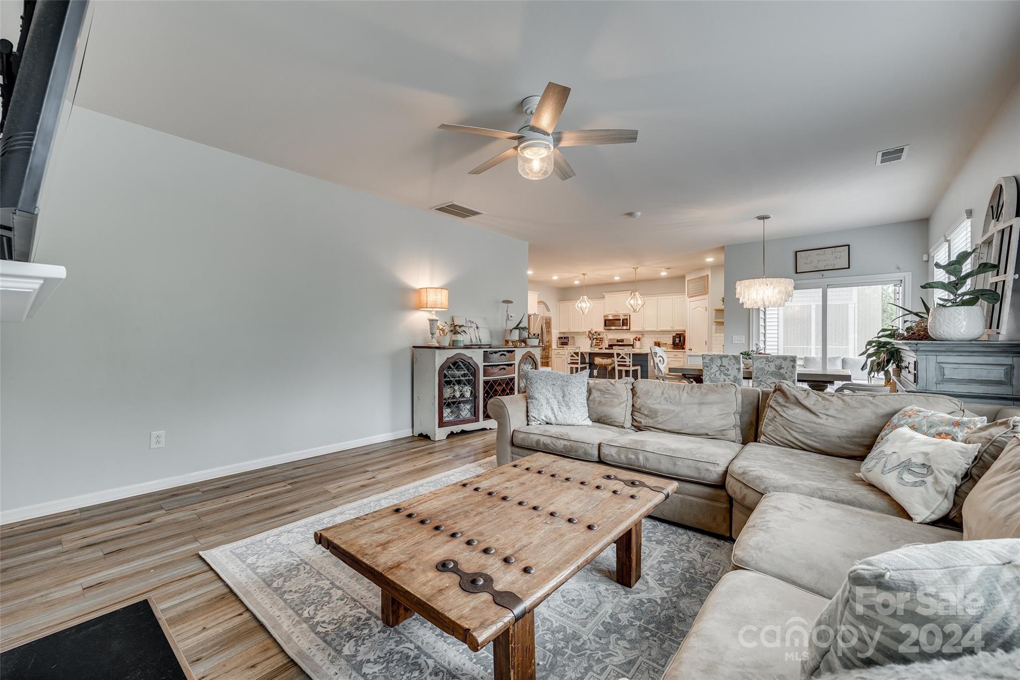 2251 Elmview Lane Fort Mill, SC 29715 - Photo 14 of 46 a living room with furniture and kitchen view
