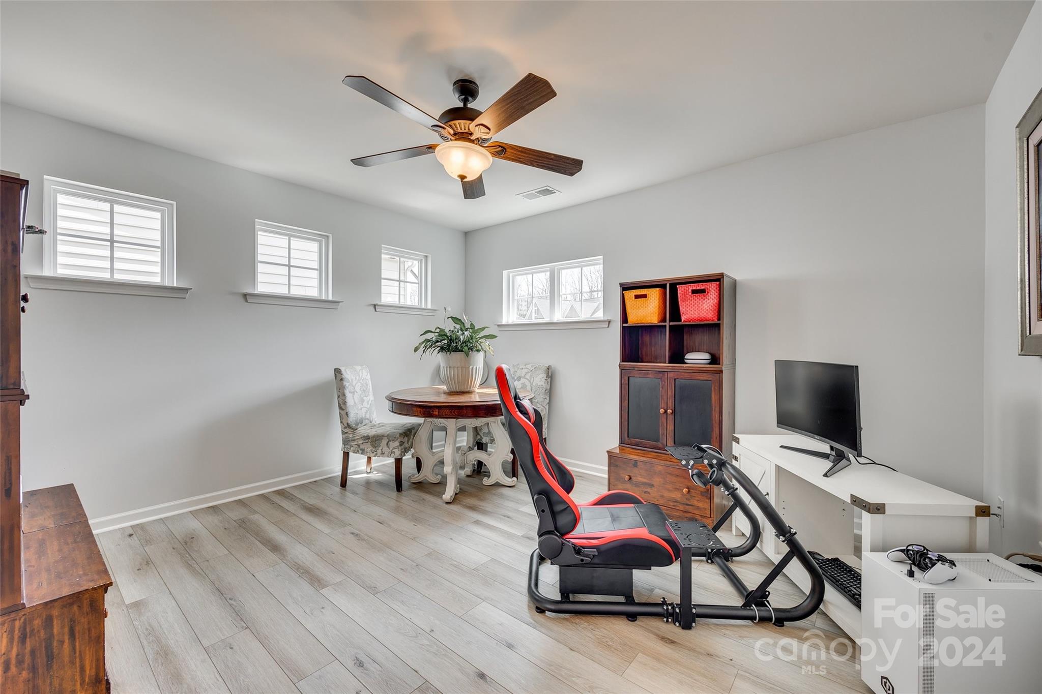 2251 Elmview Lane Fort Mill, SC 29715 - Photo 17 of 46 a workspace with furniture wooden floor and windows