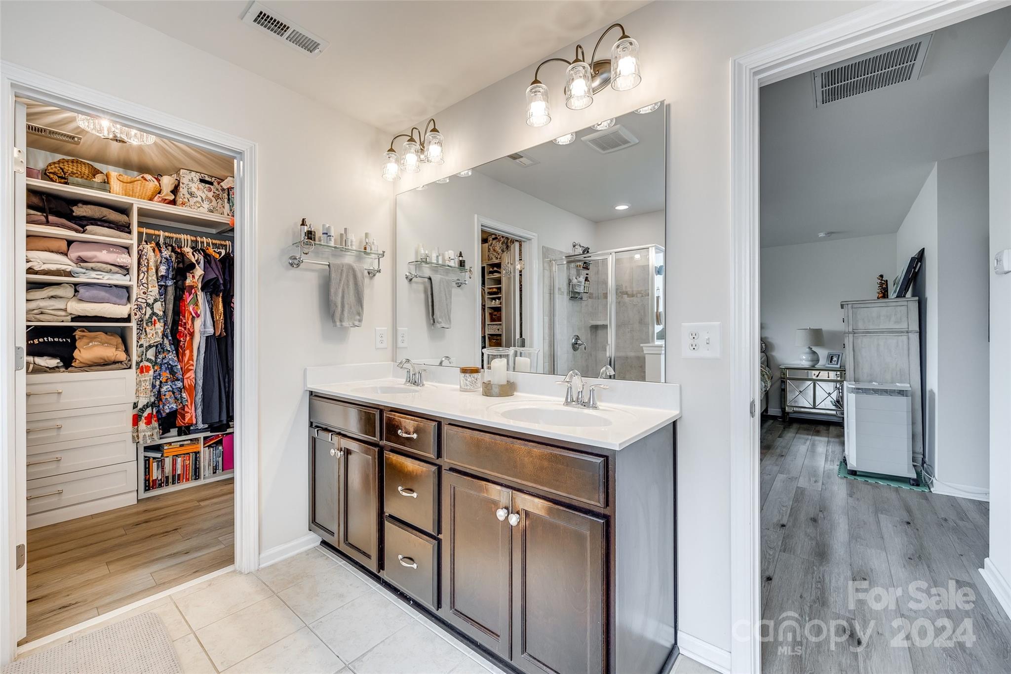 2251 Elmview Lane Fort Mill, SC 29715 - Photo 29 of 46 a bathroom with a sink double vanity and a mirror
