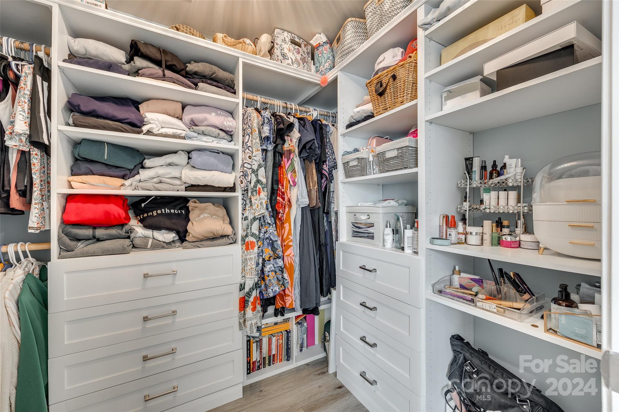 2251 Elmview Lane Fort Mill, SC 29715 - Photo 33 of 46 a view of walk in closet with clothes and shoes