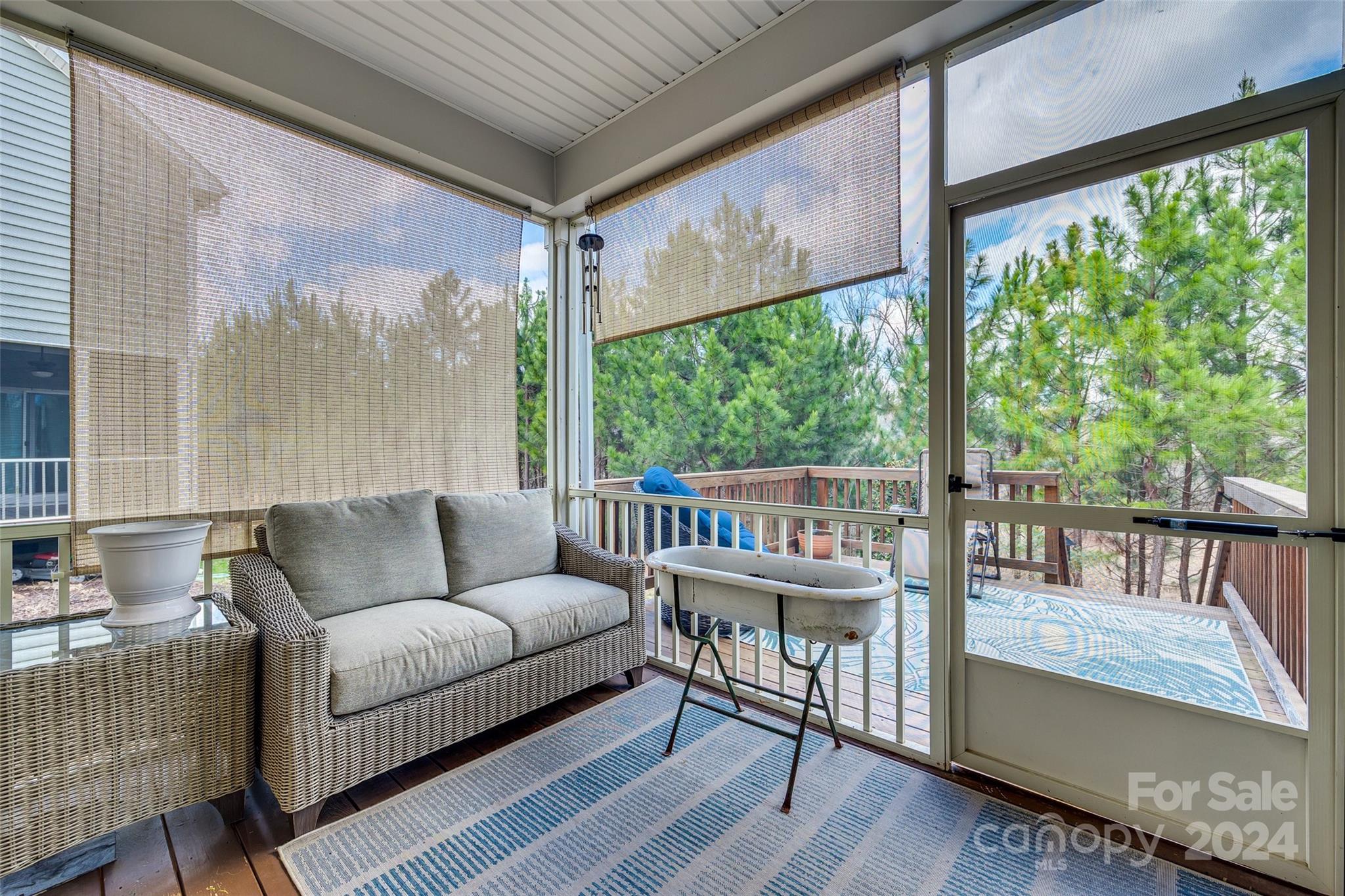 2251 Elmview Lane Fort Mill, SC 29715 - Photo 35 of 46 a balcony with furniture and wooden floor