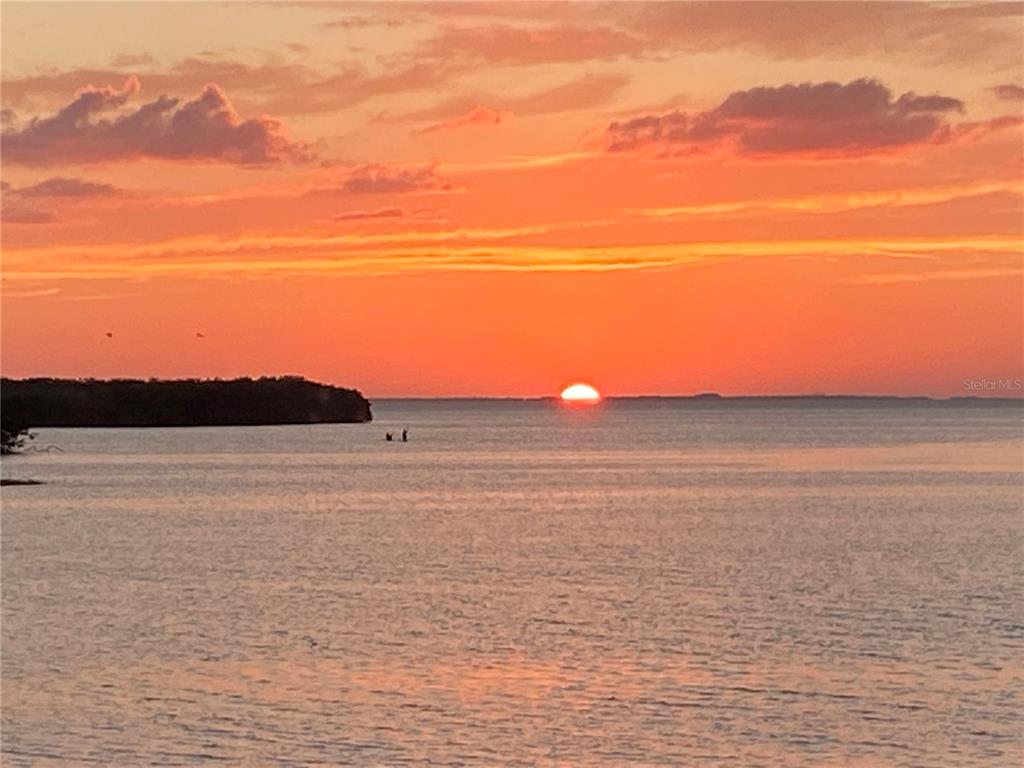 3840 Rudder Way New Port Richey, FL 34652 - Photo 13 of 18 a view of an ocean beach and mountain