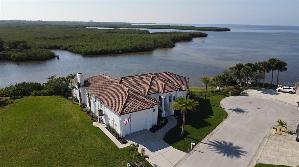3840 Rudder Way New Port Richey, FL 34652 - Photo 18 of 18 a view of a chairs and table on the terrace