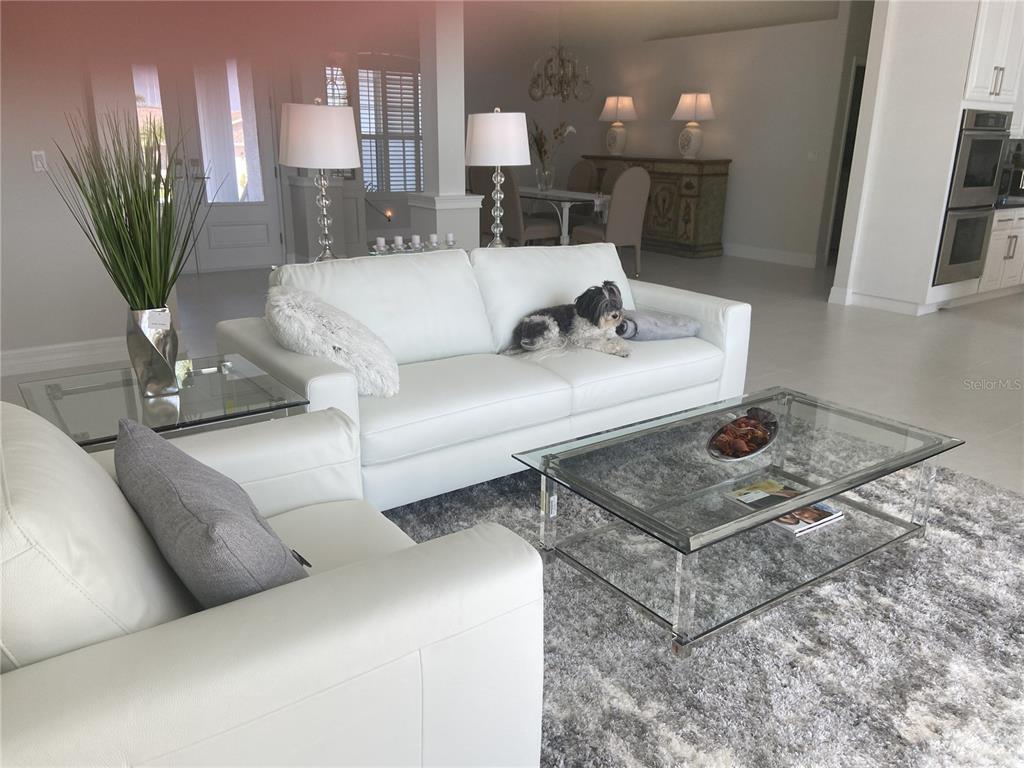 3840 Rudder Way New Port Richey, FL 34652 - Photo 4 of 18 a living room with furniture and a table