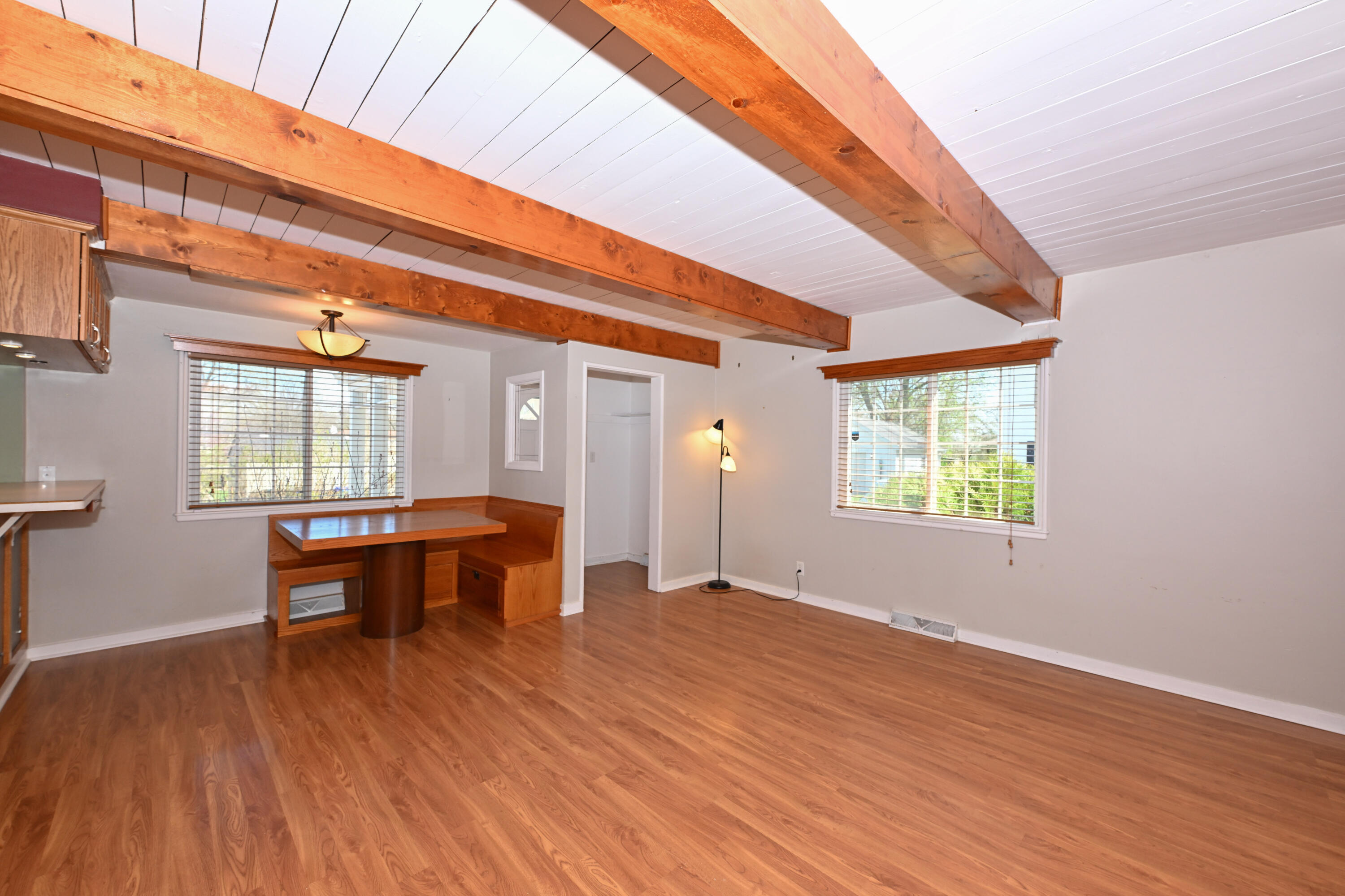 6700 Conifer Lane Greendale, WI 53129 - Photo 4 of 27 Living room and booth seating