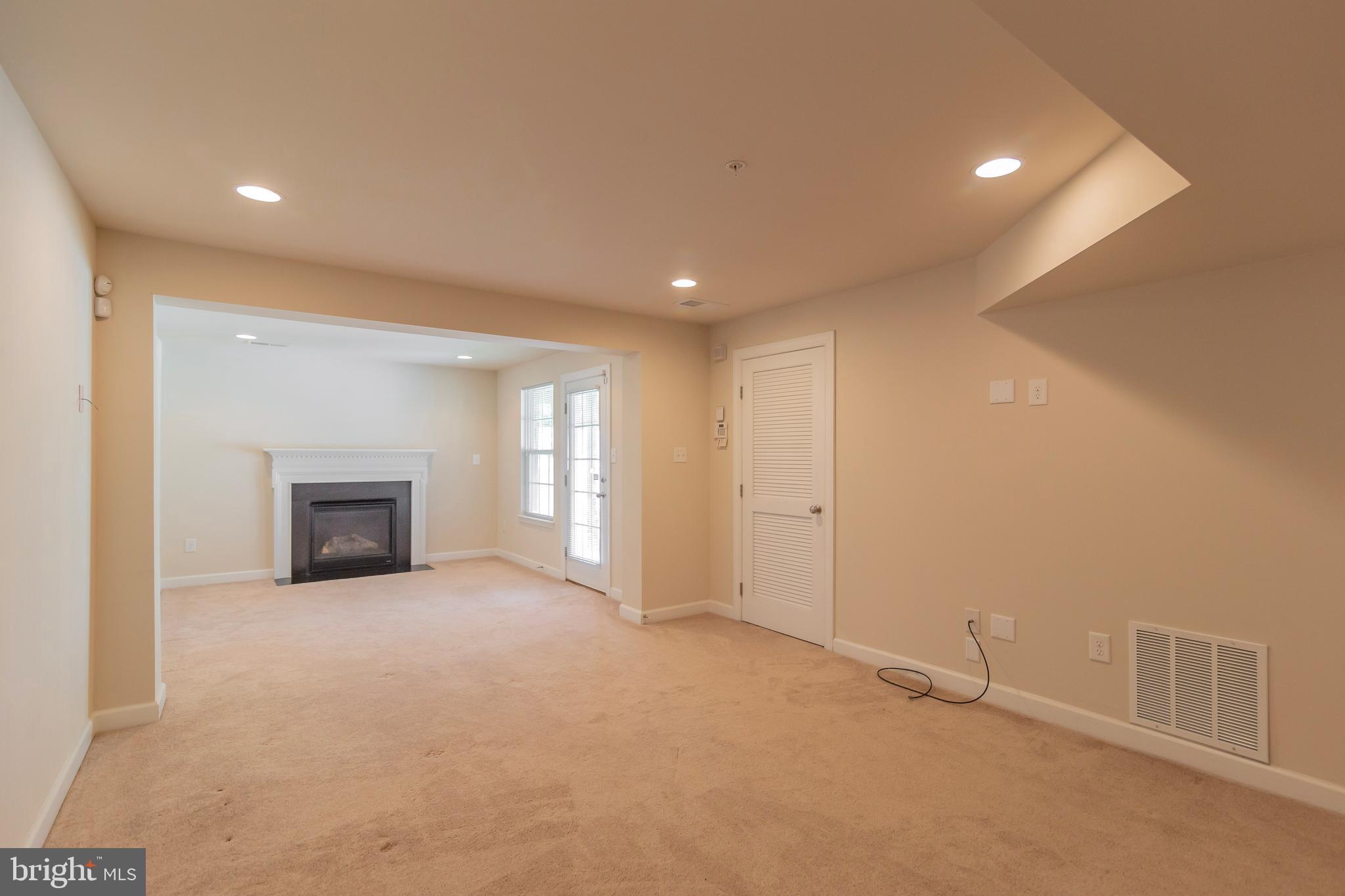 2000 Spring Run Circle Frederick, MD 21702 - Photo 10 of 49 MAIN LEVEL REC ROOM WITH FIREPLACE