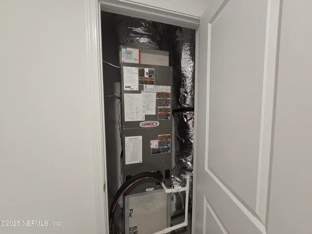 a view of a swimming pool with an outdoor space and seating area