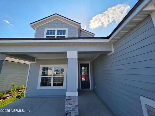 a view of a bathroom from the hallway