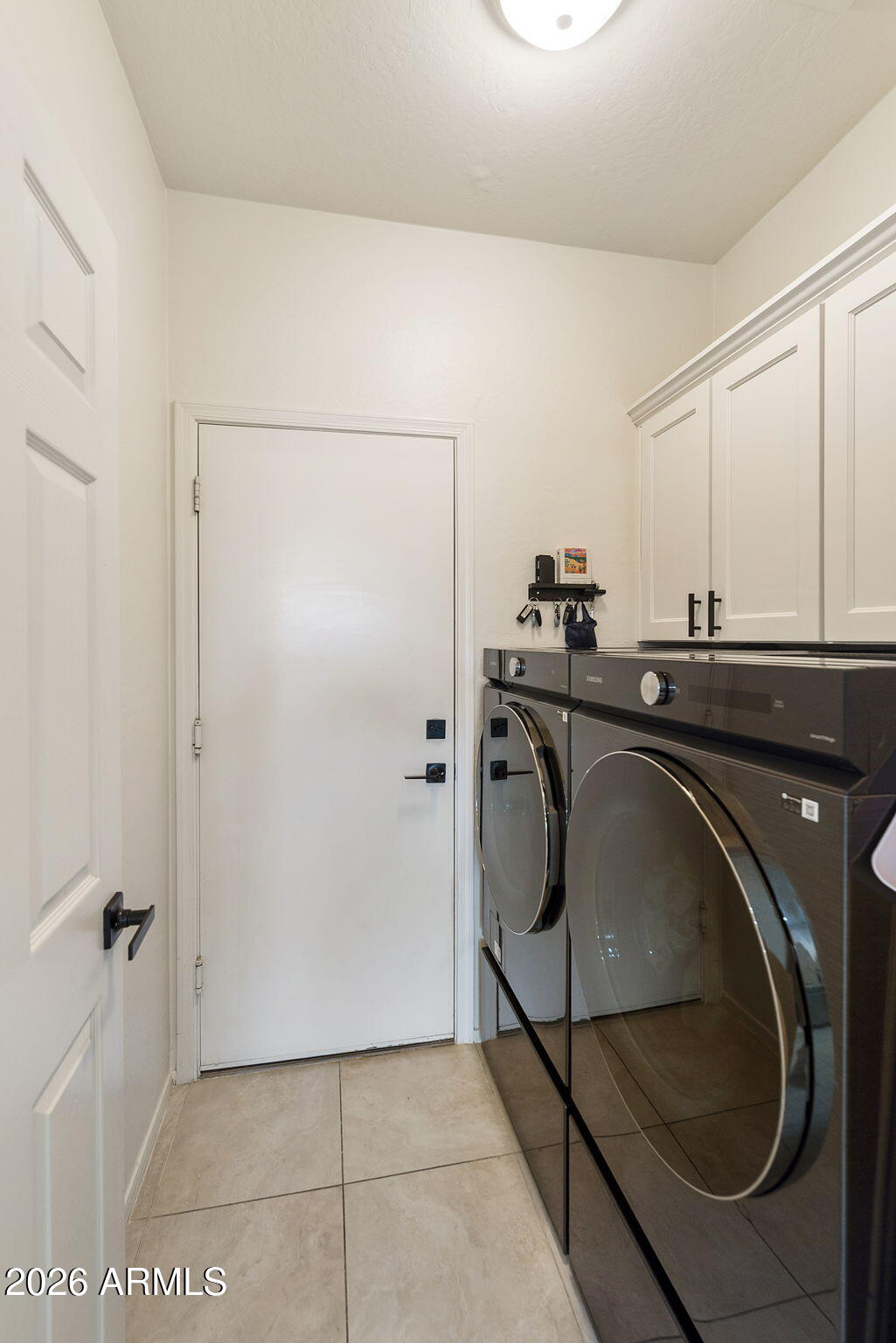 13660 West Monte Vista Road Goodyear, AZ 85395 - Photo 55 of 75 LAUNDRY ROOM