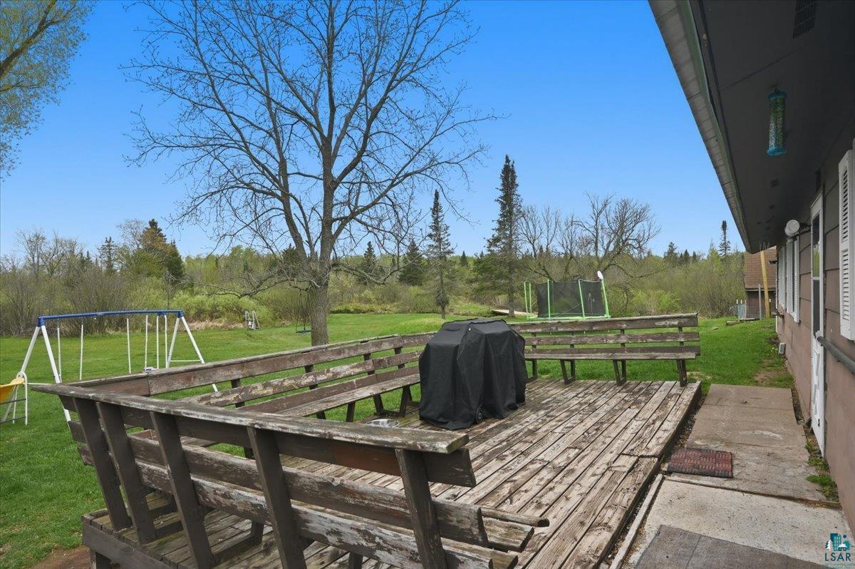 5190 County Road M Gordon, WI 54838 - Photo 22 of 31 Expansive outdoor deck with built-in bench seating