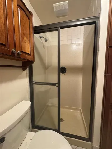 a view of gallery with wooden floor