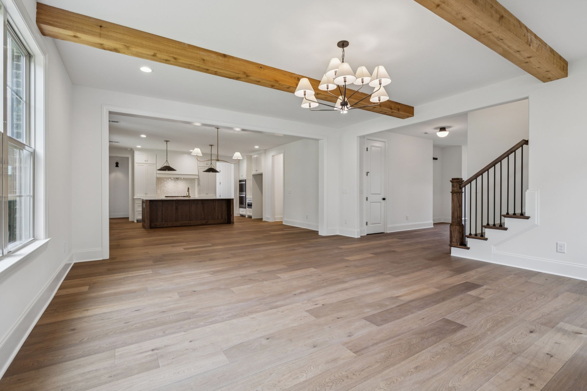 217 Bellsford Road Gallatin, TN 37066 - Photo 18 of 73 a view of a hallway with a chandelier