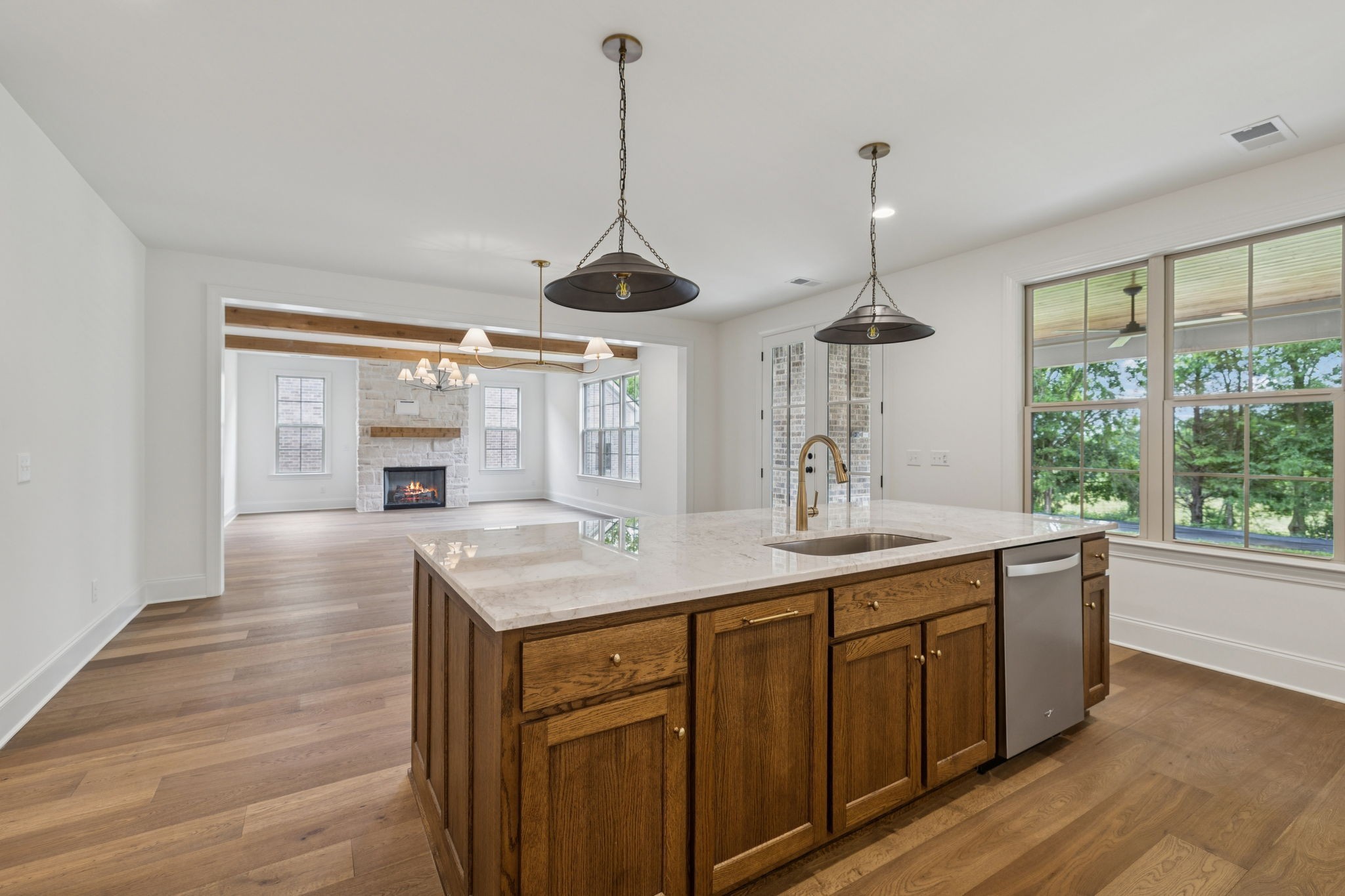 217 Bellsford Road Gallatin, TN 37066 - Photo 24 of 73 a kitchen with kitchen island granite countertop a sink stainless steel appliances and cabinets