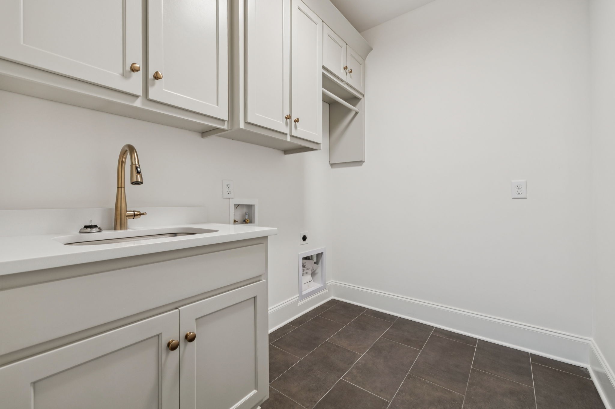 217 Bellsford Road Gallatin, TN 37066 - Photo 38 of 73 a kitchen with a sink cabinets and utility