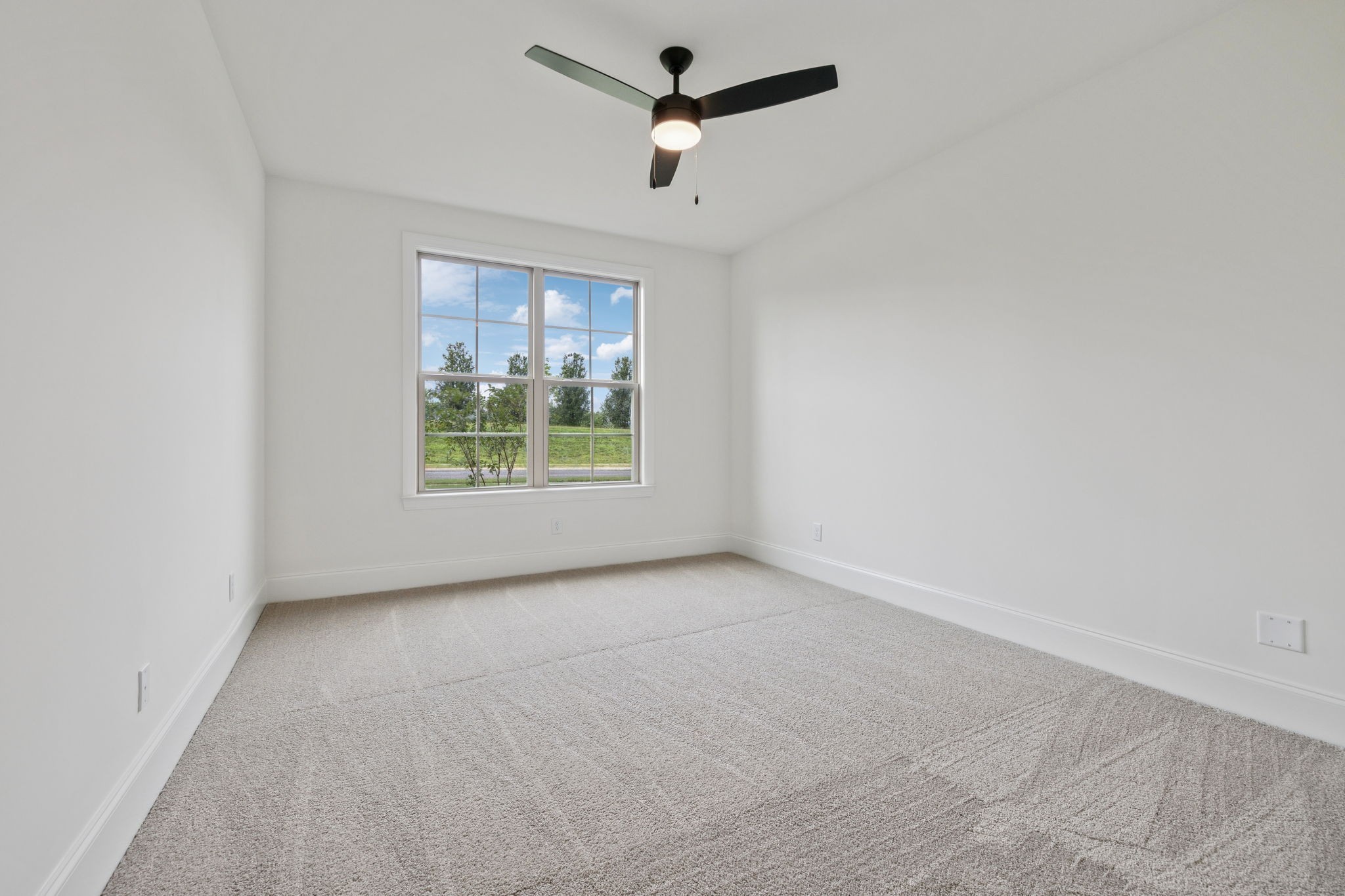 217 Bellsford Road Gallatin, TN 37066 - Photo 40 of 73 an empty room with windows and ceiling fan