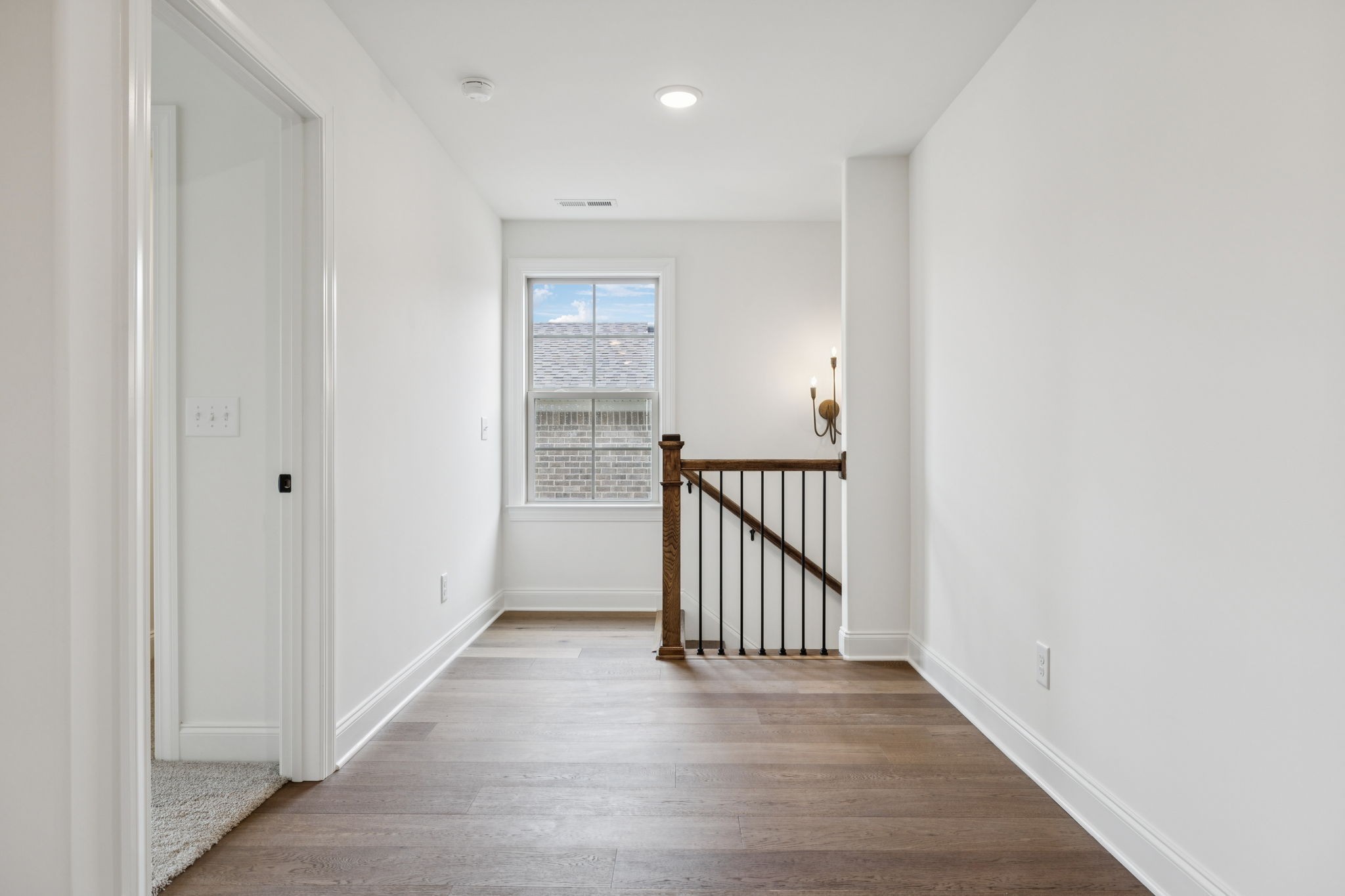 217 Bellsford Road Gallatin, TN 37066 - Photo 43 of 73 a view of a hallway with wooden floor and entryway