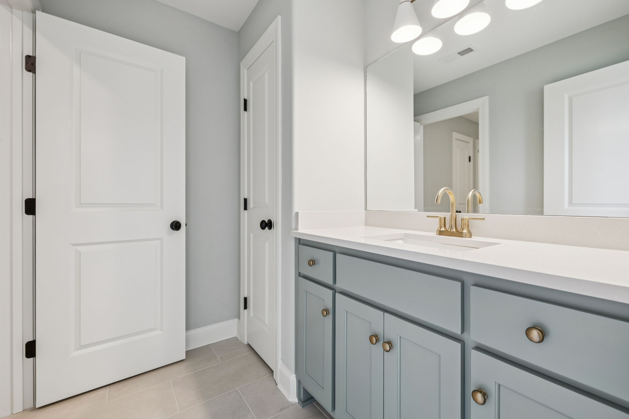 217 Bellsford Road Gallatin, TN 37066 - Photo 47 of 73 a bathroom with a sink and a mirror